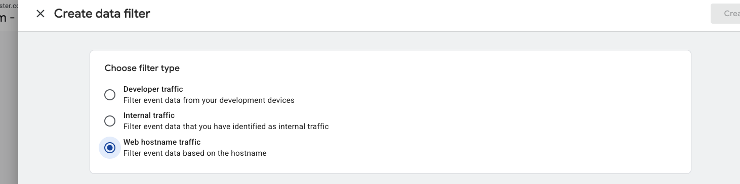 GA4 Create data filter dialog showing Web hostname traffic option selected